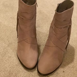 Vince Camuto taupe booties with fringe.